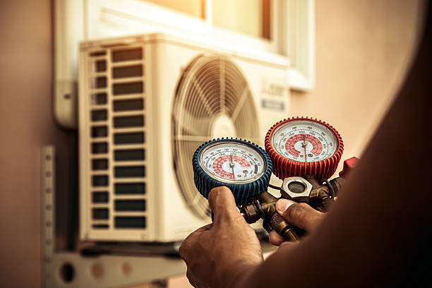 Professional Air Conditioning Service technician working in Flemington, PA